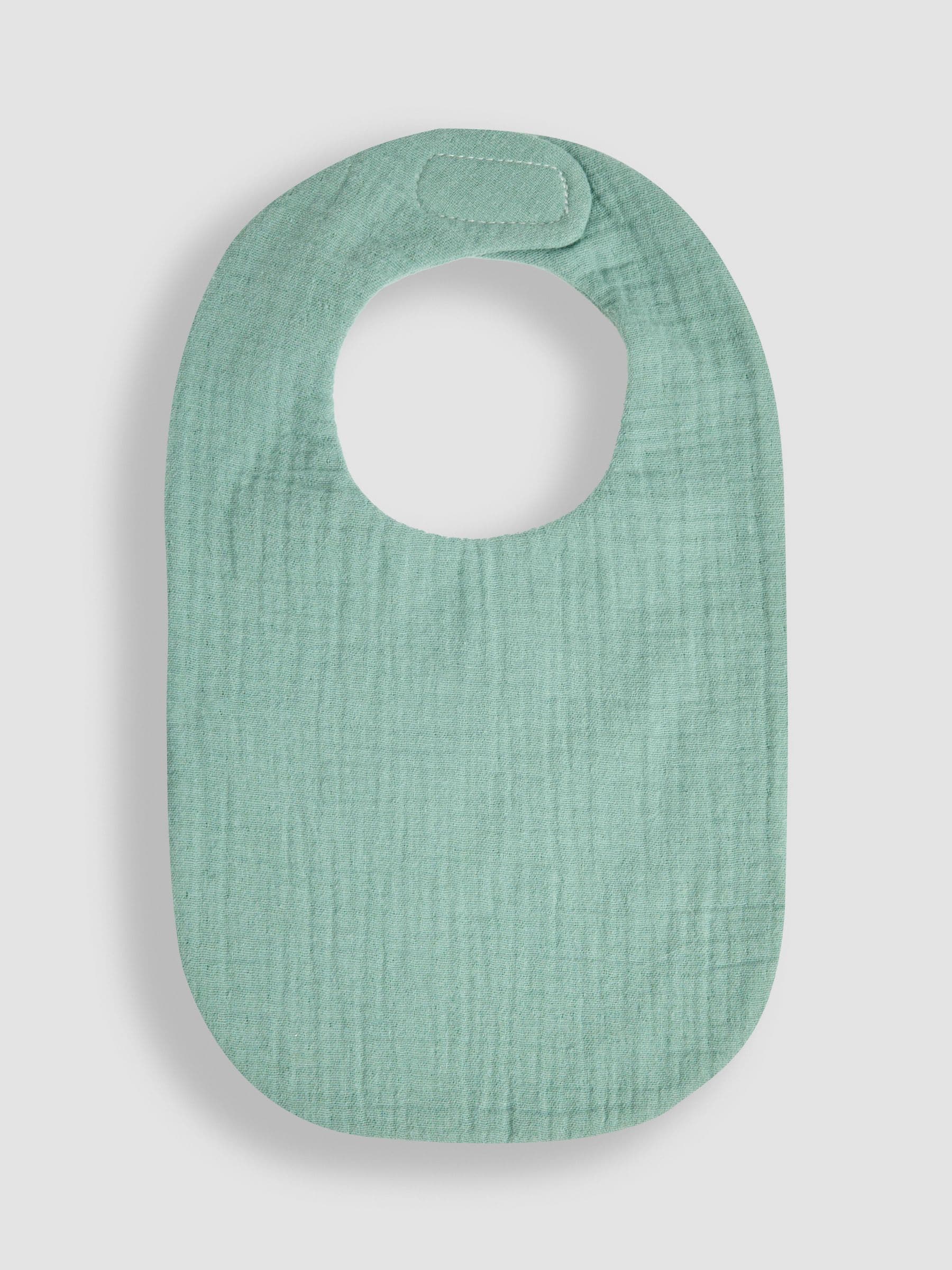 JoJo Maman Bébé green muslin frill bib, UK version