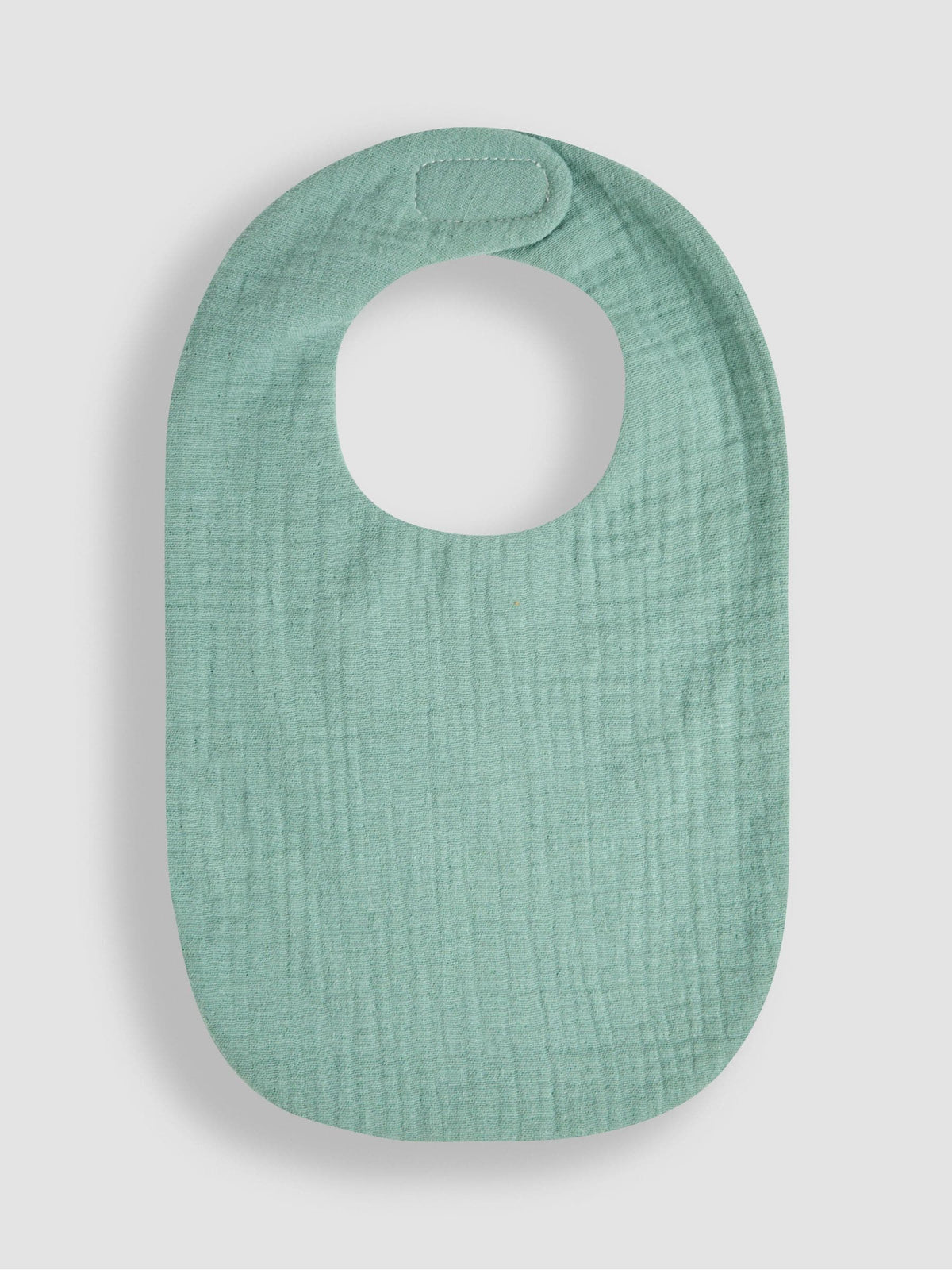JoJo Maman Bébé green muslin frill bib, UK version