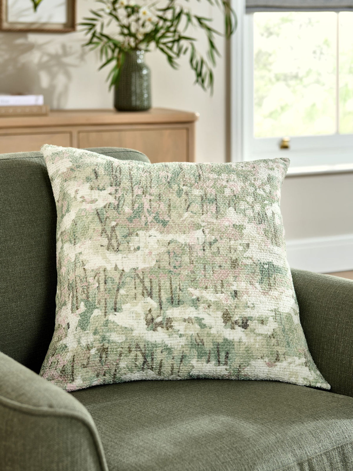 Sage green abstract floral print cushion, 50x50cm, imported from the UK
