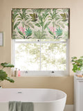 Tropical leaf print blackout roller blind in green and pink, UK version