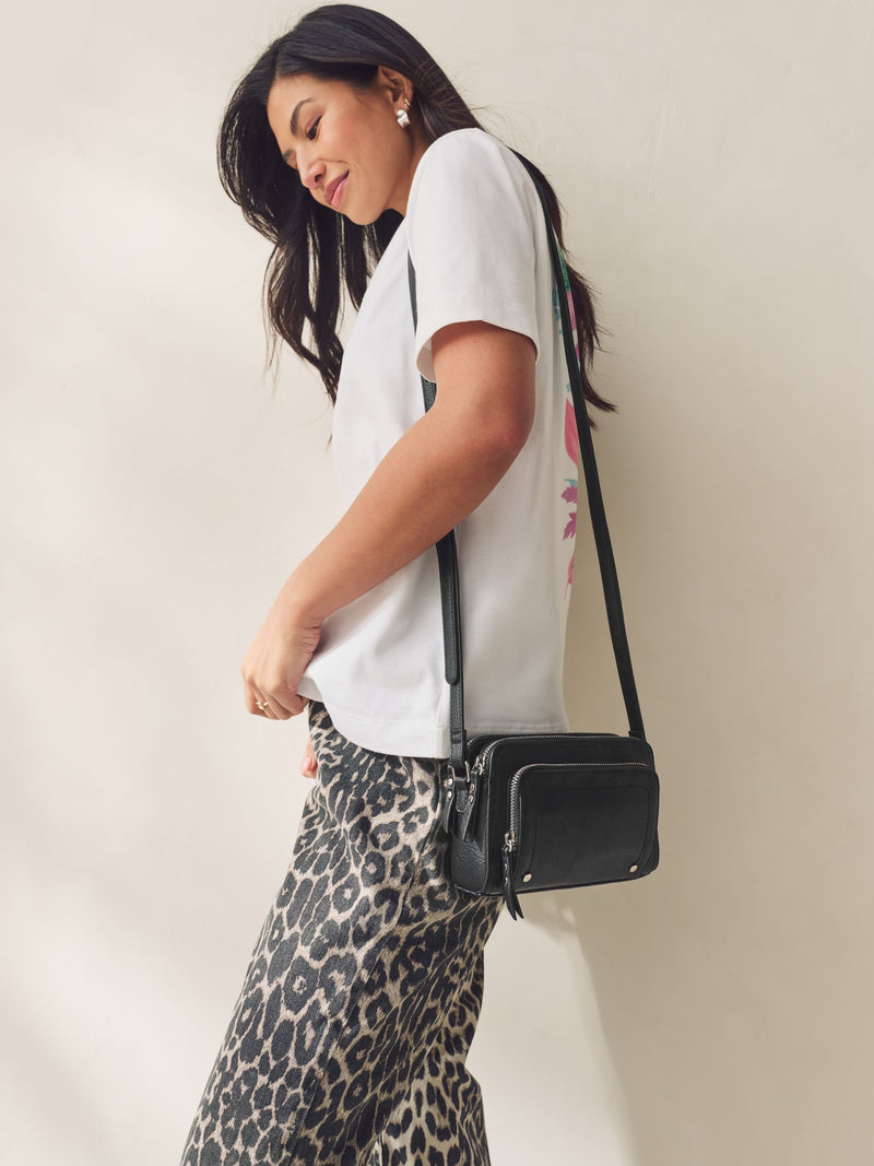 Black double zip cross body bag with adjustable strap, imported from the UK