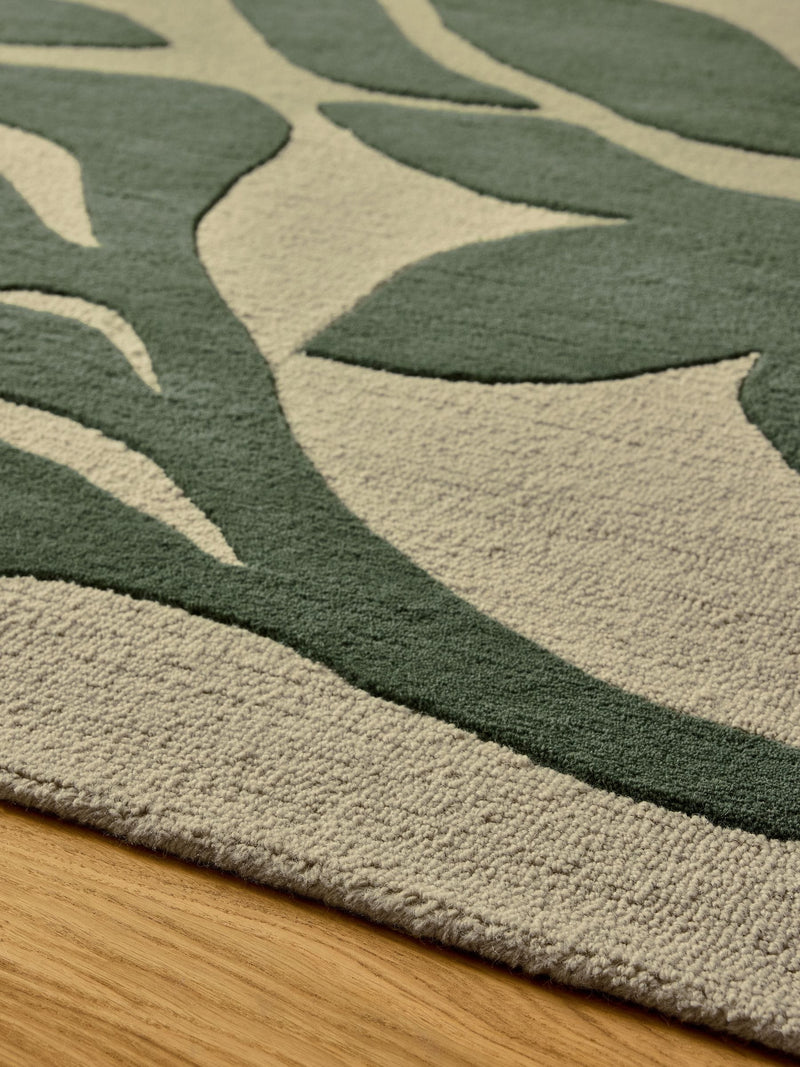 French Connection green abstract leaf wool tufted rug, imported from the UK
