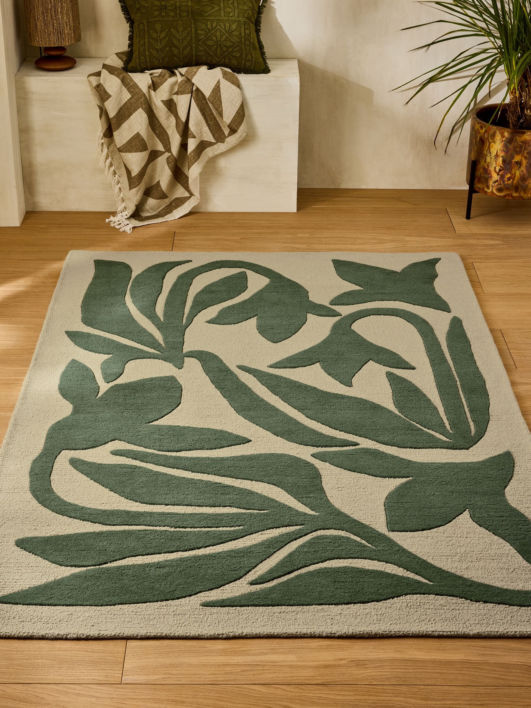 French Connection green abstract leaf wool tufted rug, imported from the UK