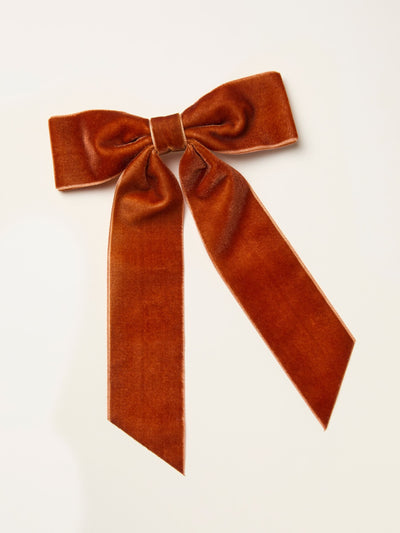 Nœud papillon en velours orange brûlé pour queues de cheval élégantes
