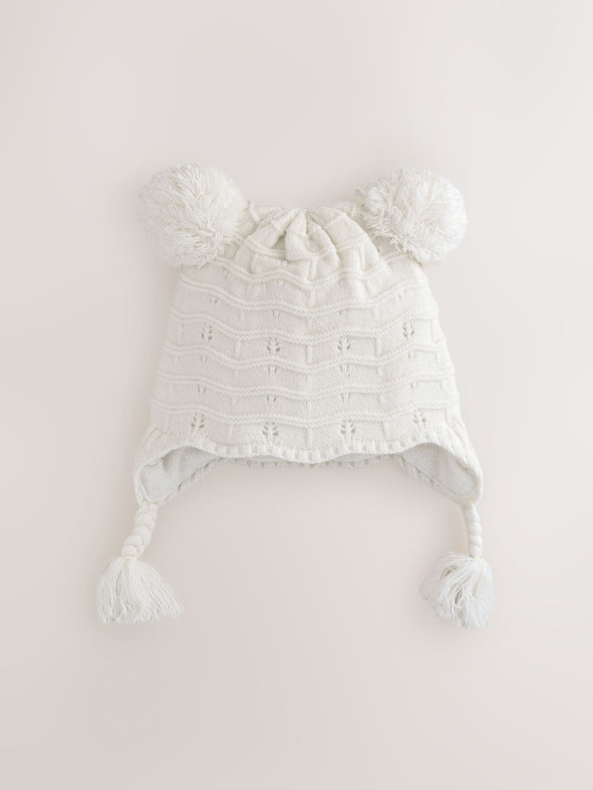 White knitted baby trapper hat double pom, imported from the UK