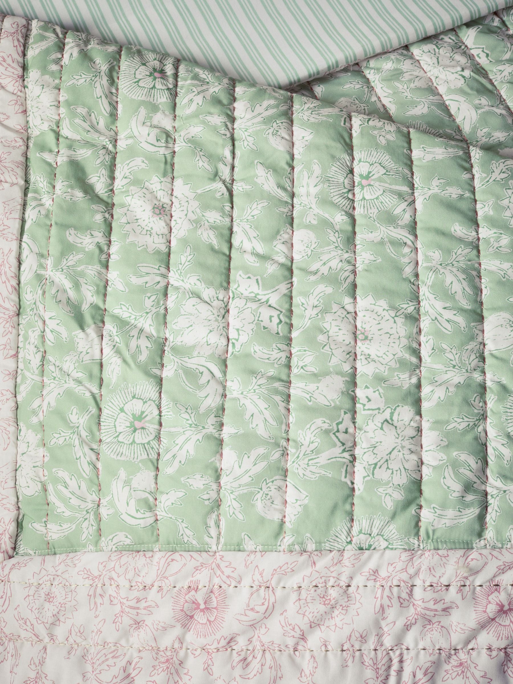 Pale pink floral woodblock quilted bedspread, imported from the UK