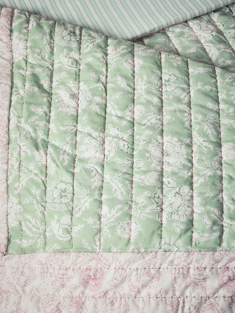 Pale pink floral woodblock quilted bedspread, imported from the UK