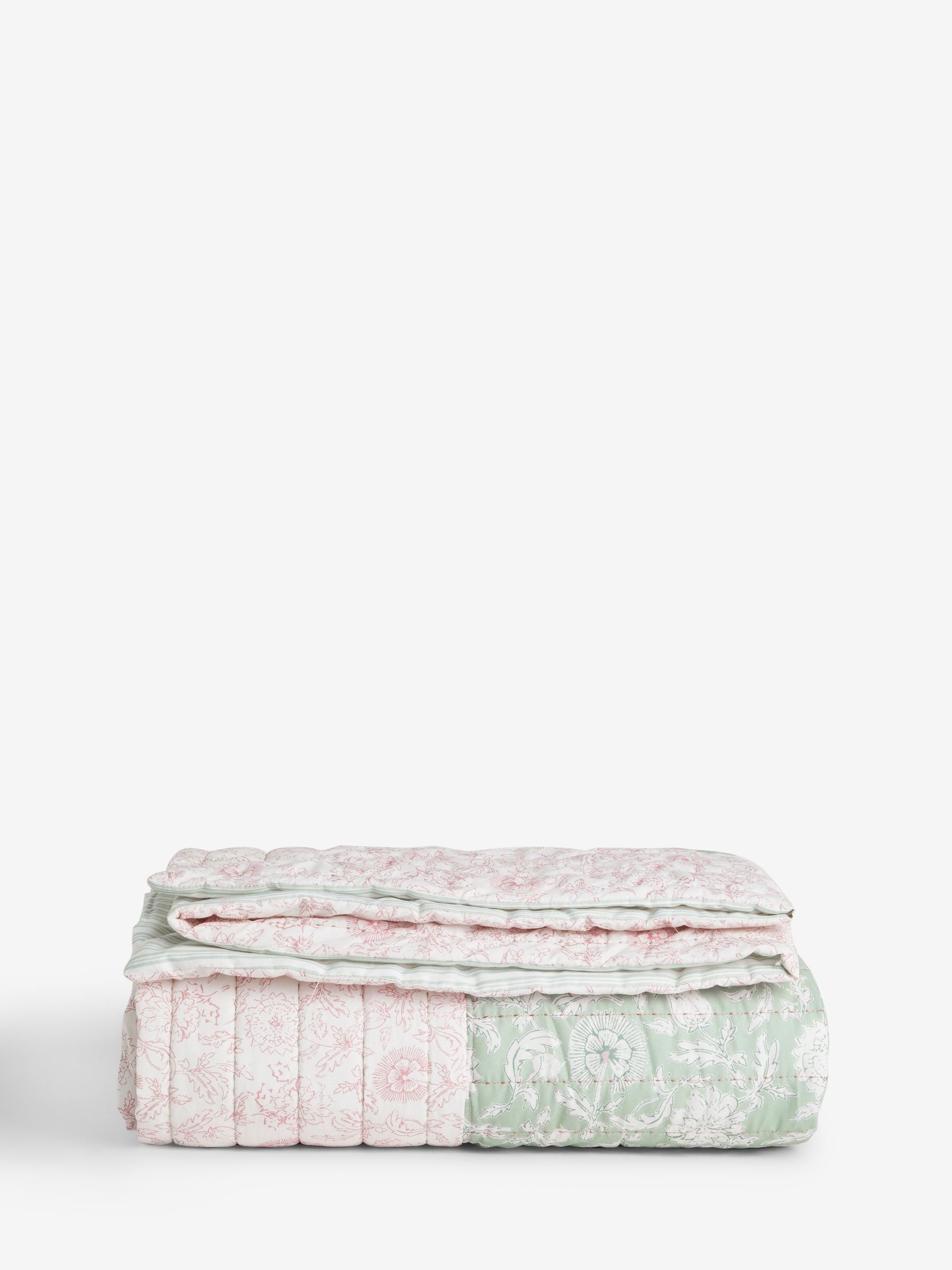 Pale pink floral woodblock quilted bedspread, imported from the UK