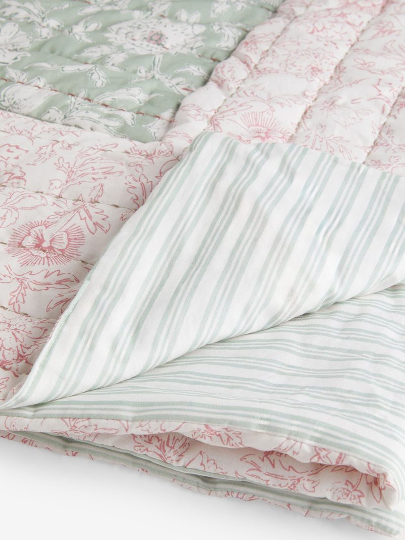 Pale pink floral woodblock quilted bedspread, imported from the UK