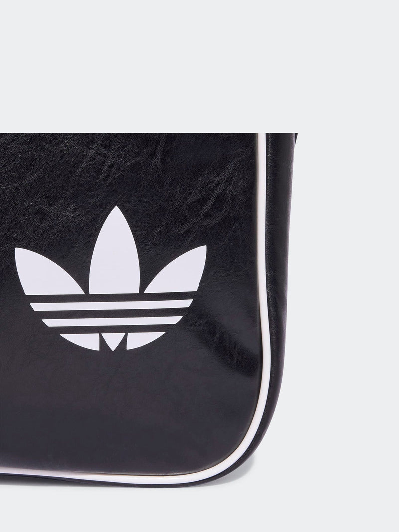 adidas Originals black airliner bag faux leather 17.7L, imported from the UK