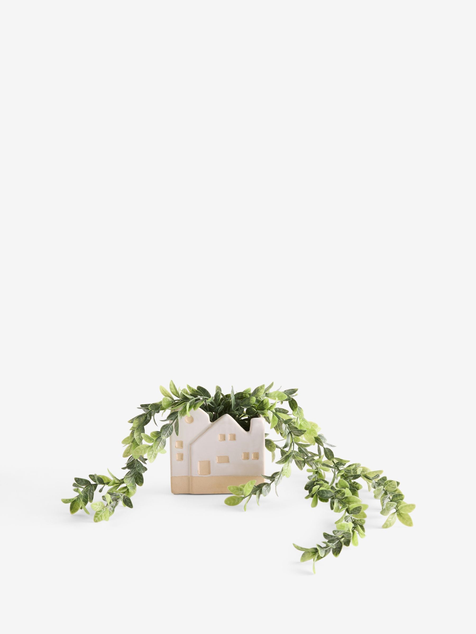 Artificial trailing plant in ceramic house shaped pot - British product