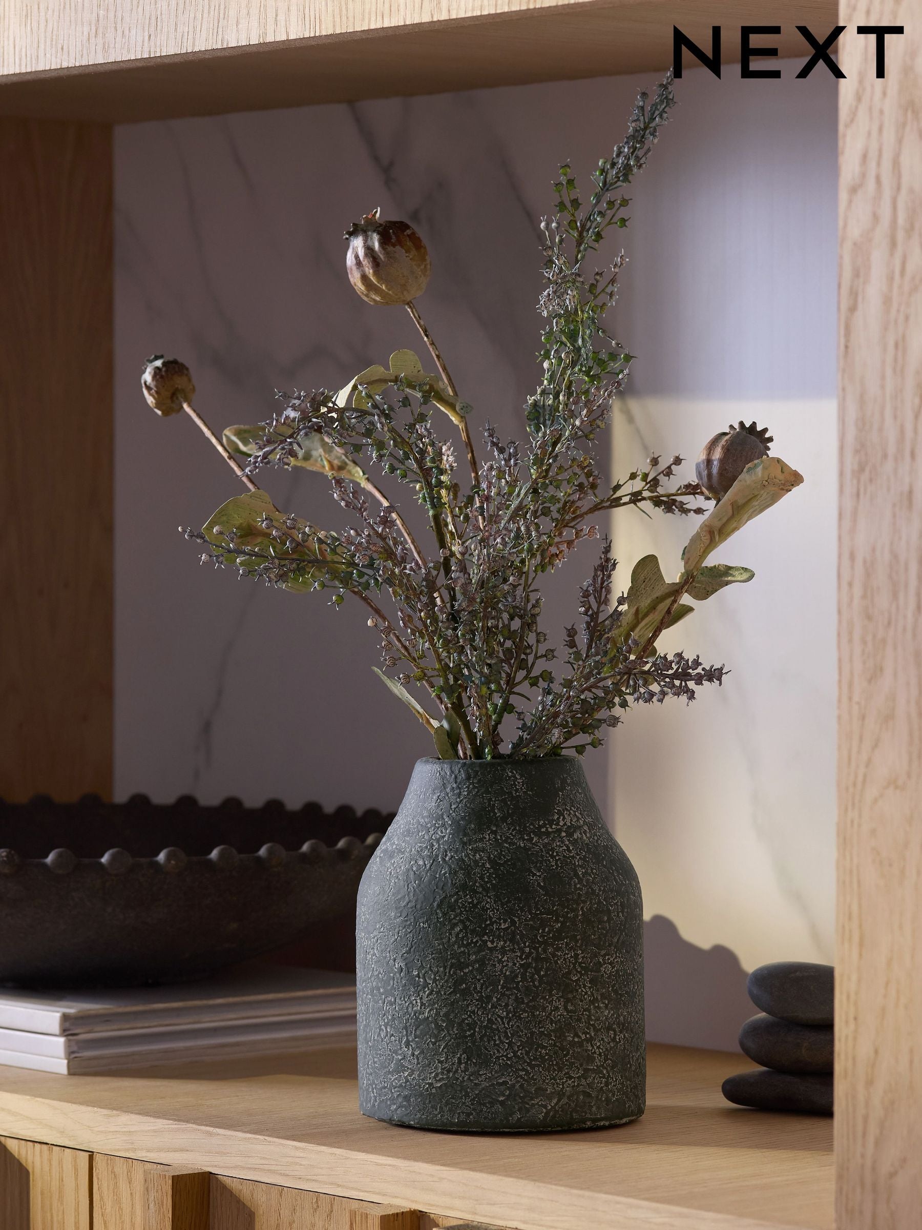 Artificial dried seed pod arrangement in stone-effect vase 45cm height, imported from the UK