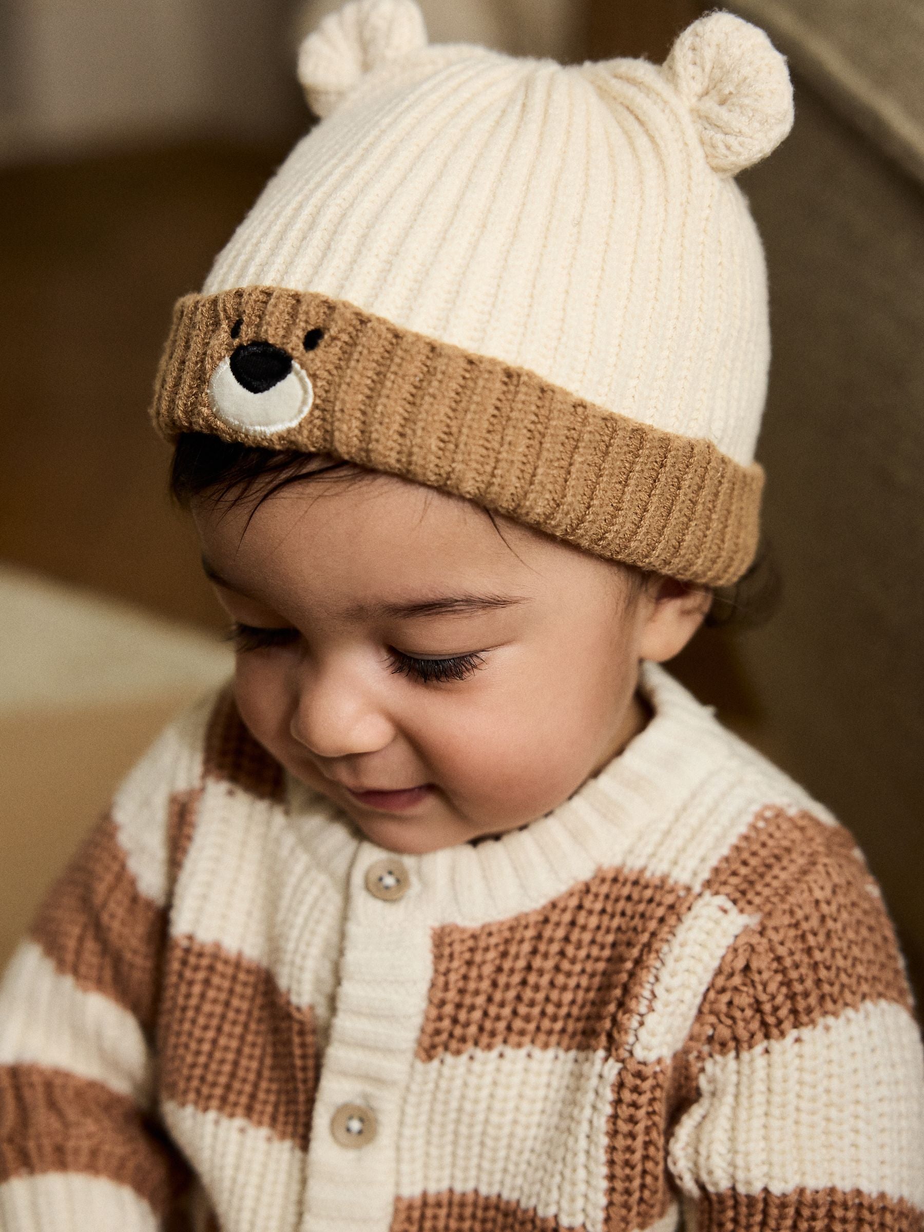 Brown Bear Face ribbed baby beanie hat from a British brand