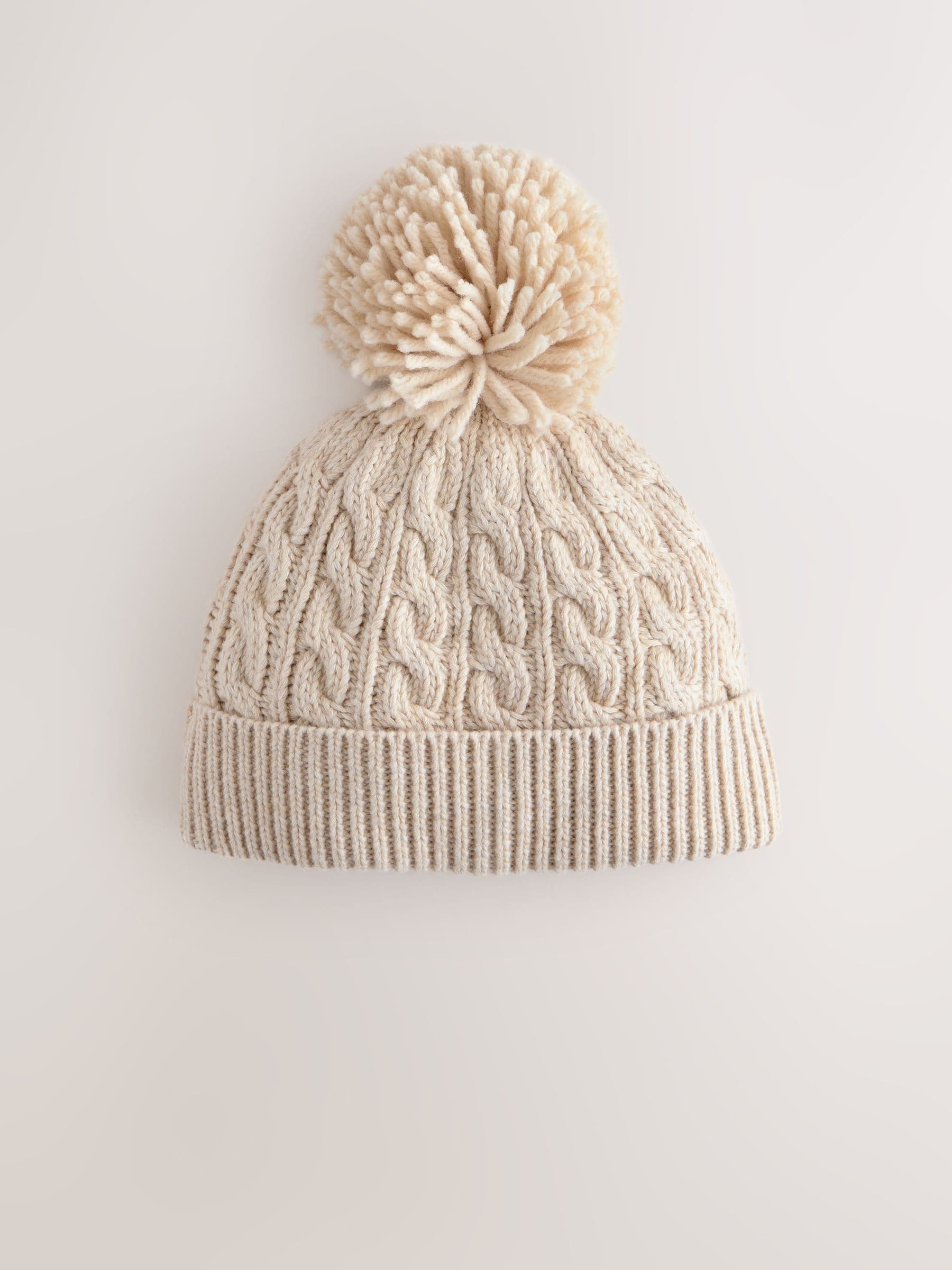 Cream knitted cable pom beanie, UK version