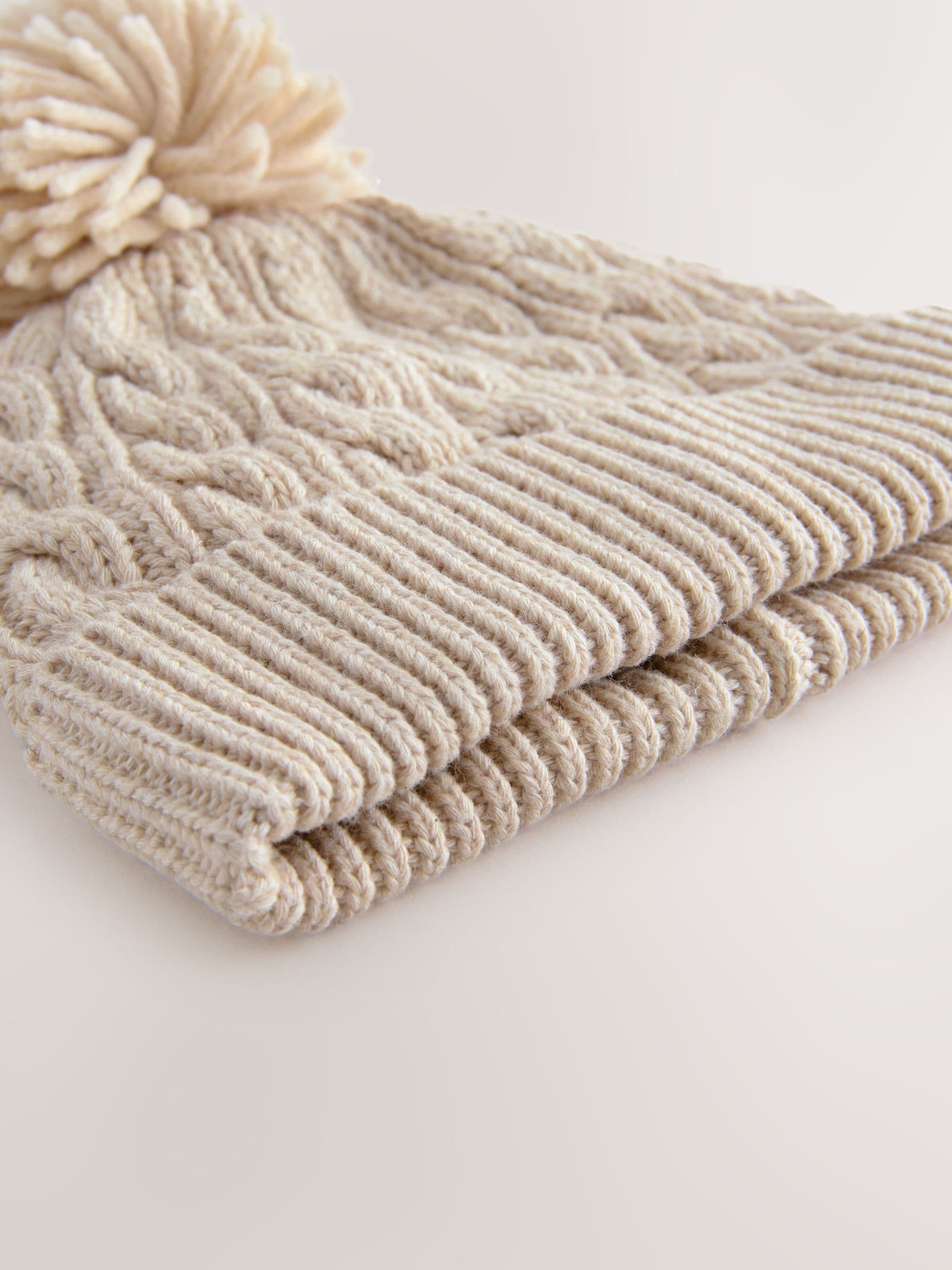 Cream knitted cable pom beanie, UK version