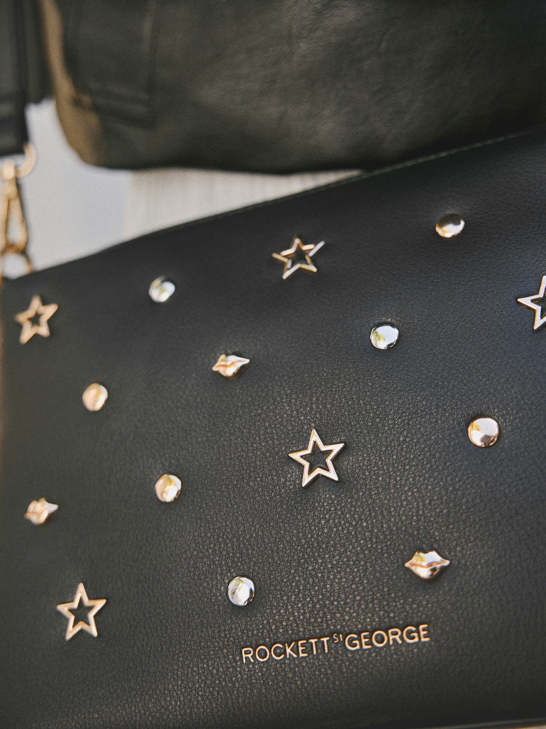 Rockett St George Black Icon Stud cross-body bag, imported from the UK