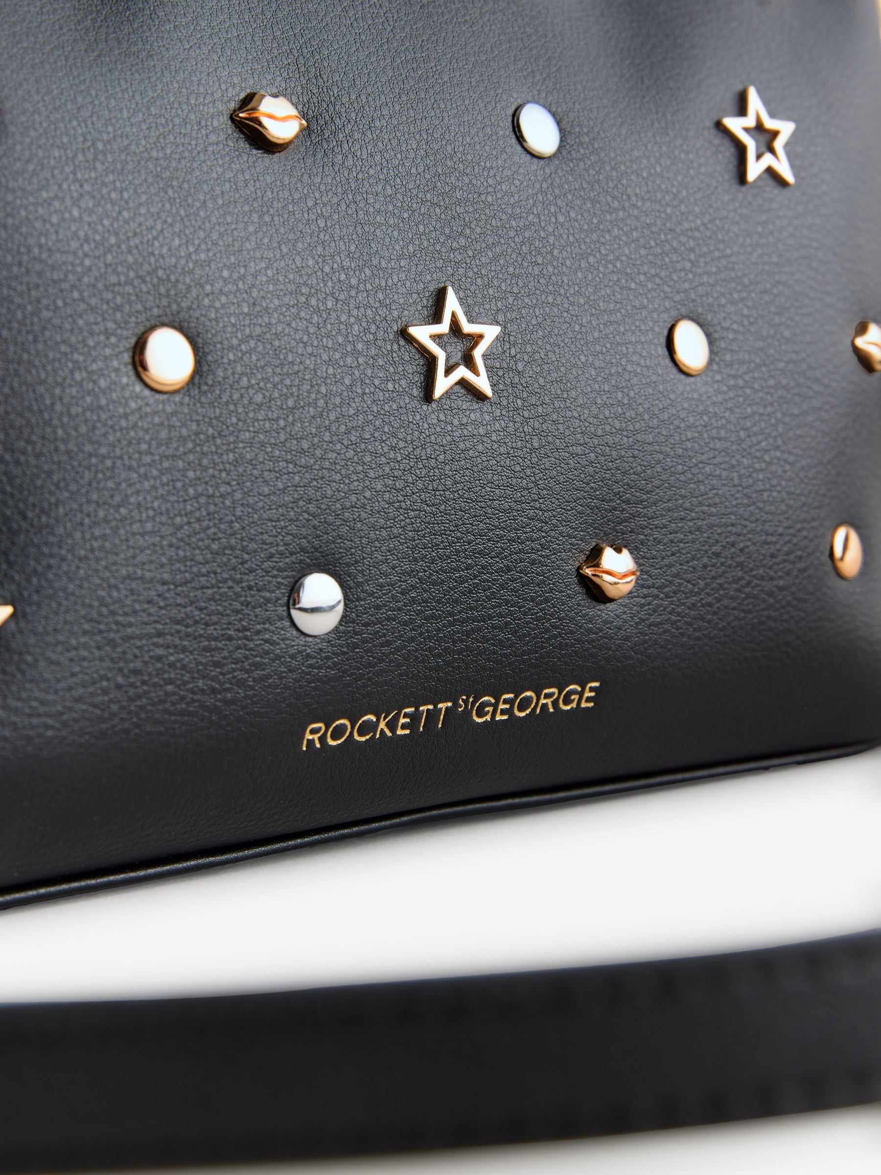 Rockett St George Black Icon Stud cross-body bag, imported from the UK