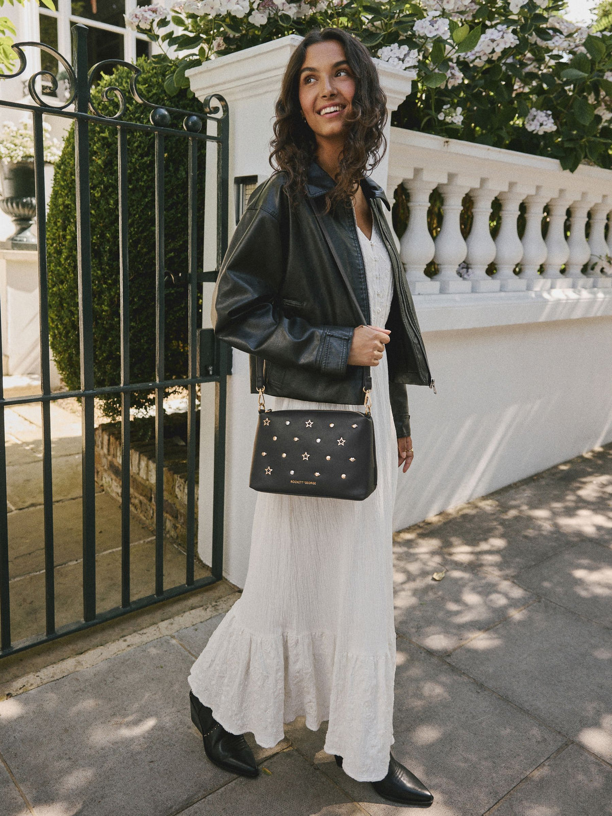 Rockett St George Black Icon Stud cross-body bag, imported from the UK