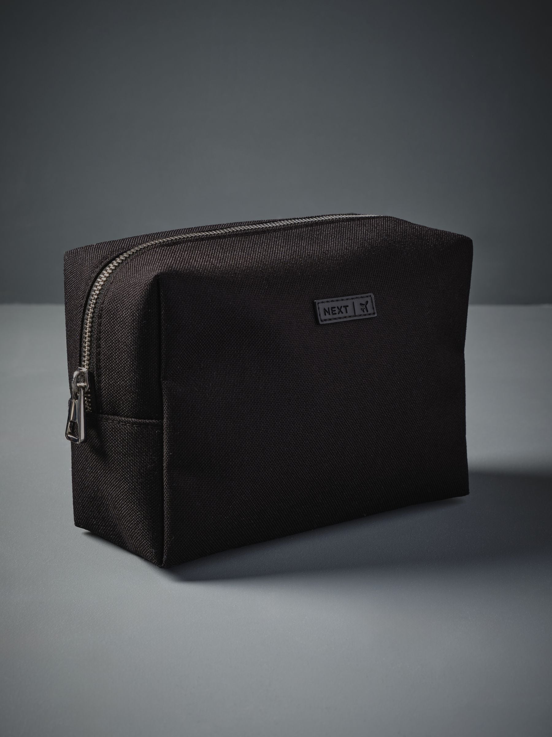 Two-piece travel wash bag set for grooming essentials (British brand)