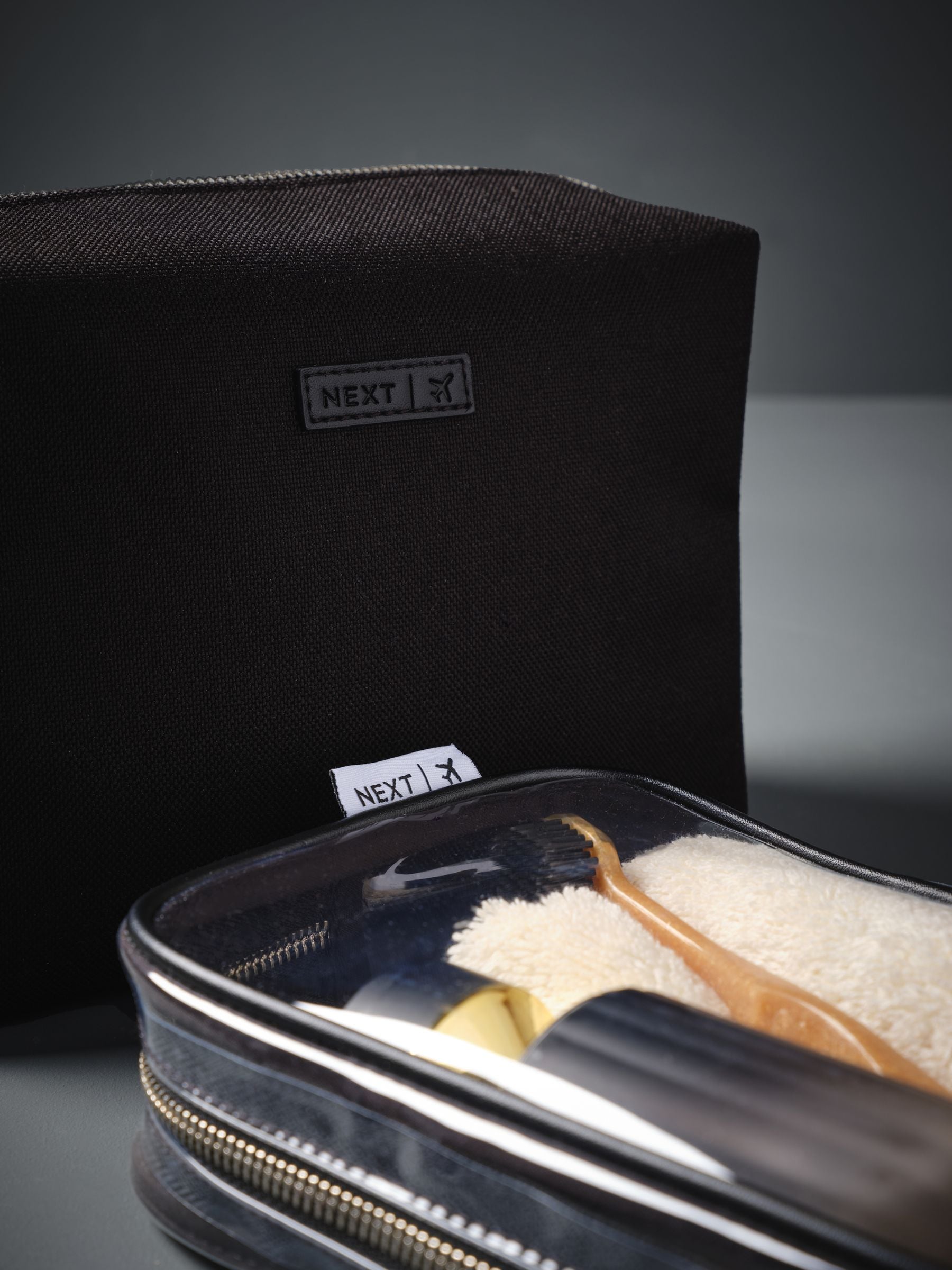 Two-piece travel wash bag set for grooming essentials (British brand)