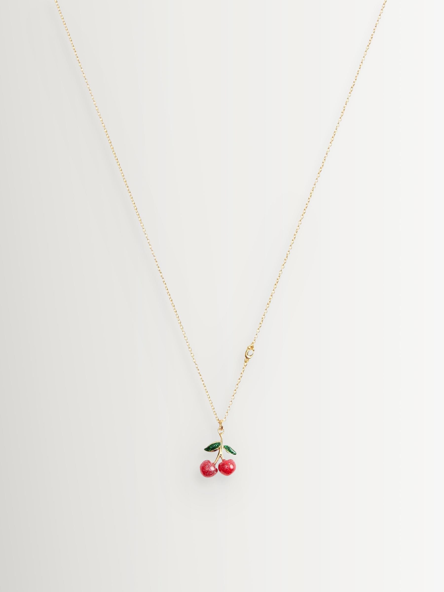 COACH gold tone signature cherry pendant necklace - British product