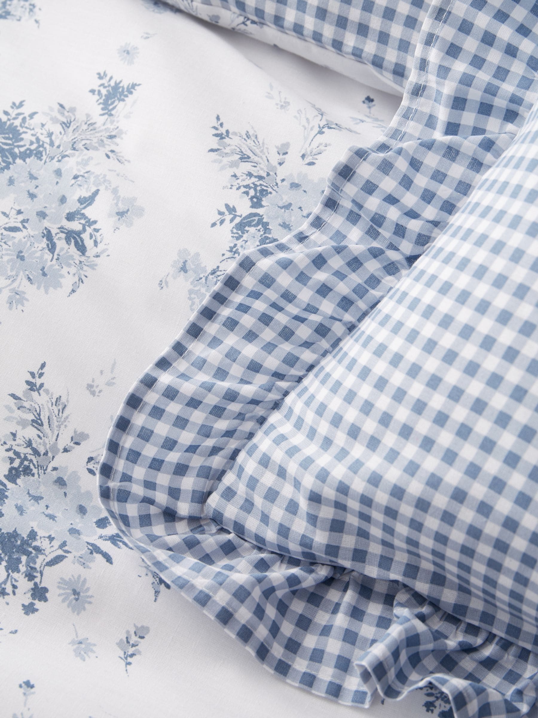 Catherine Lansfield blue gingham reversible cushion 45cm, UK version