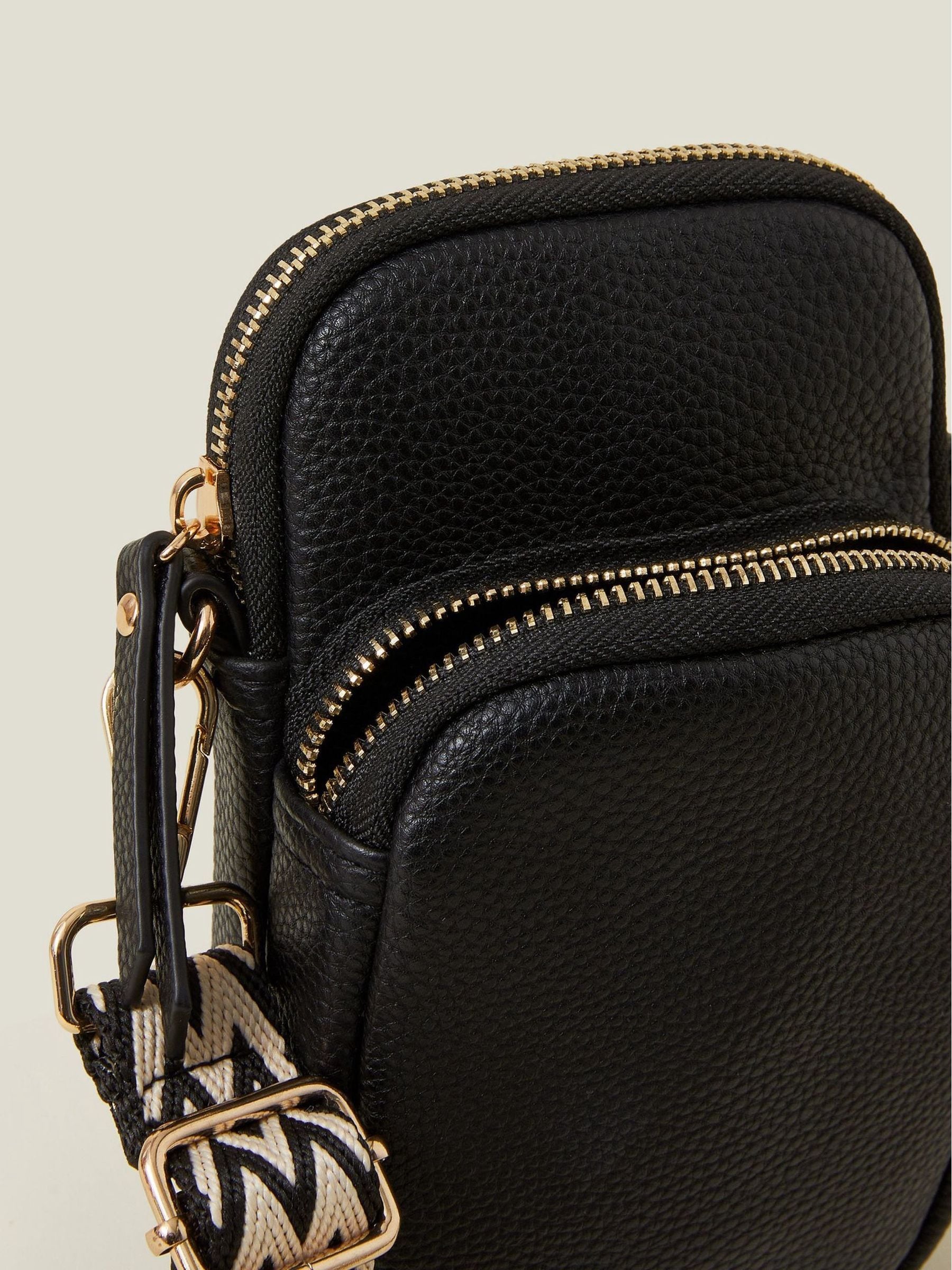 Accessorize black webbing strap phone bag, UK version