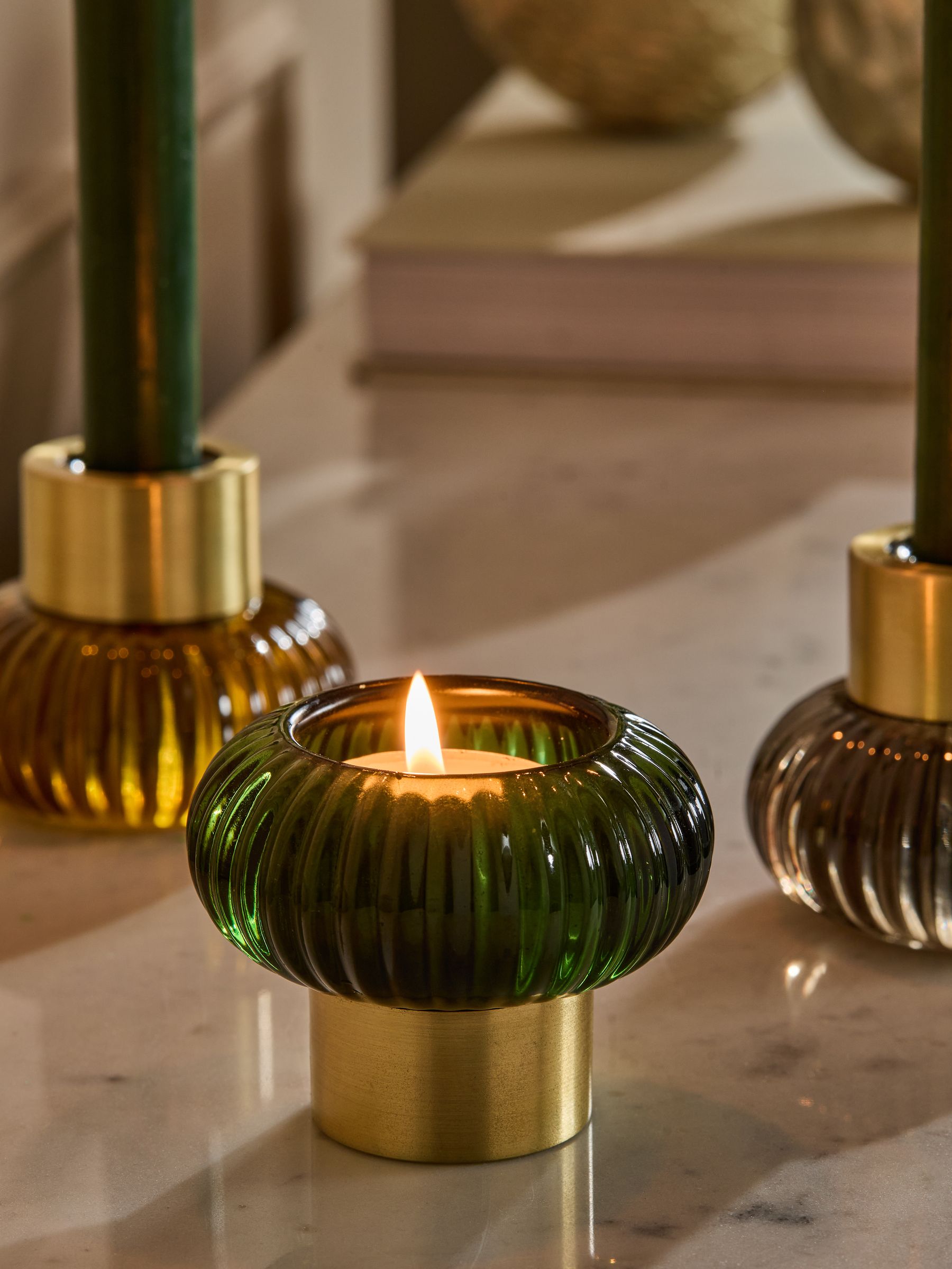 Multicolour glass candle holder for tea lights, imported from the UK