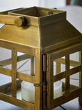 Small gold metal and glass lantern, imported from the UK