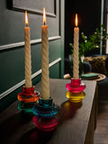 Glass tea light and taper candle holders in multicolour (British brand)