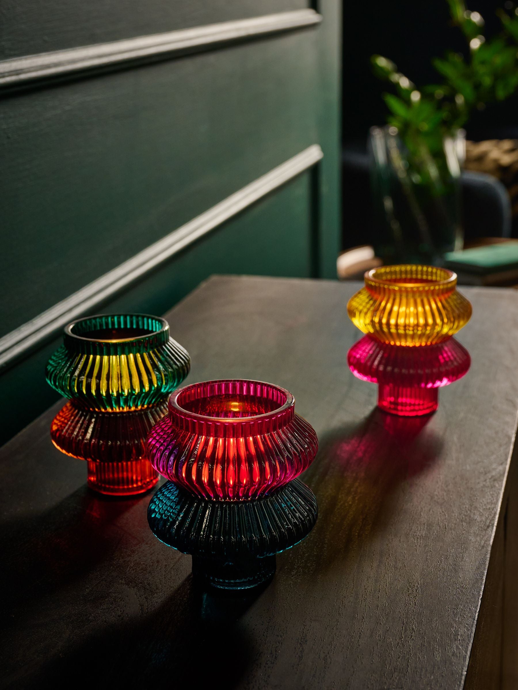 Glass tea light and taper candle holders in multicolour (British brand)
