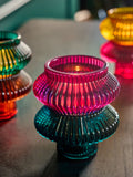 Glass tea light and taper candle holders in multicolour (British brand)