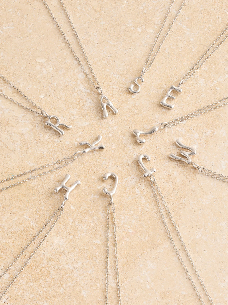 Sterling silver initial necklace pendant (British brand)