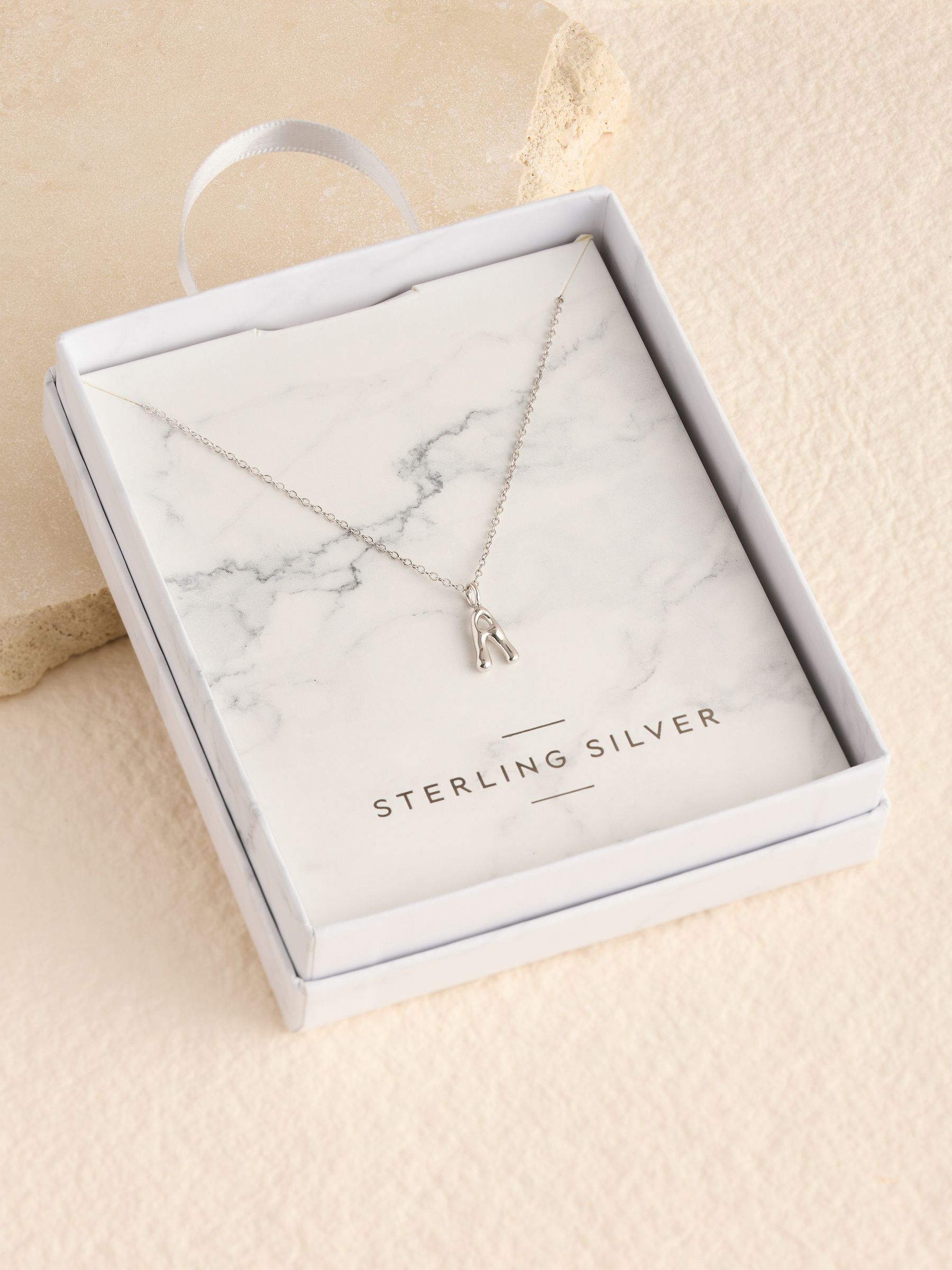 Sterling silver initial necklace pendant (British brand)