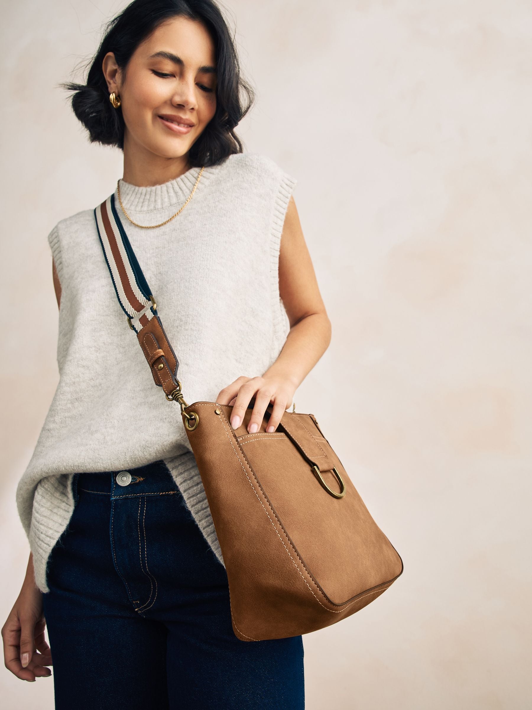 Tan brown structured messenger bag, imported from the UK