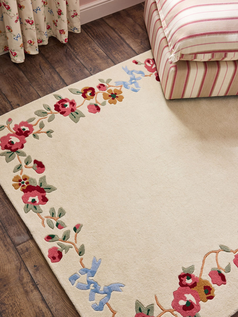 Cath Kidston wool tufted rug in rose and bows design, imported from the UK