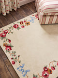 Cath Kidston wool tufted rug in rose and bows design, imported from the UK
