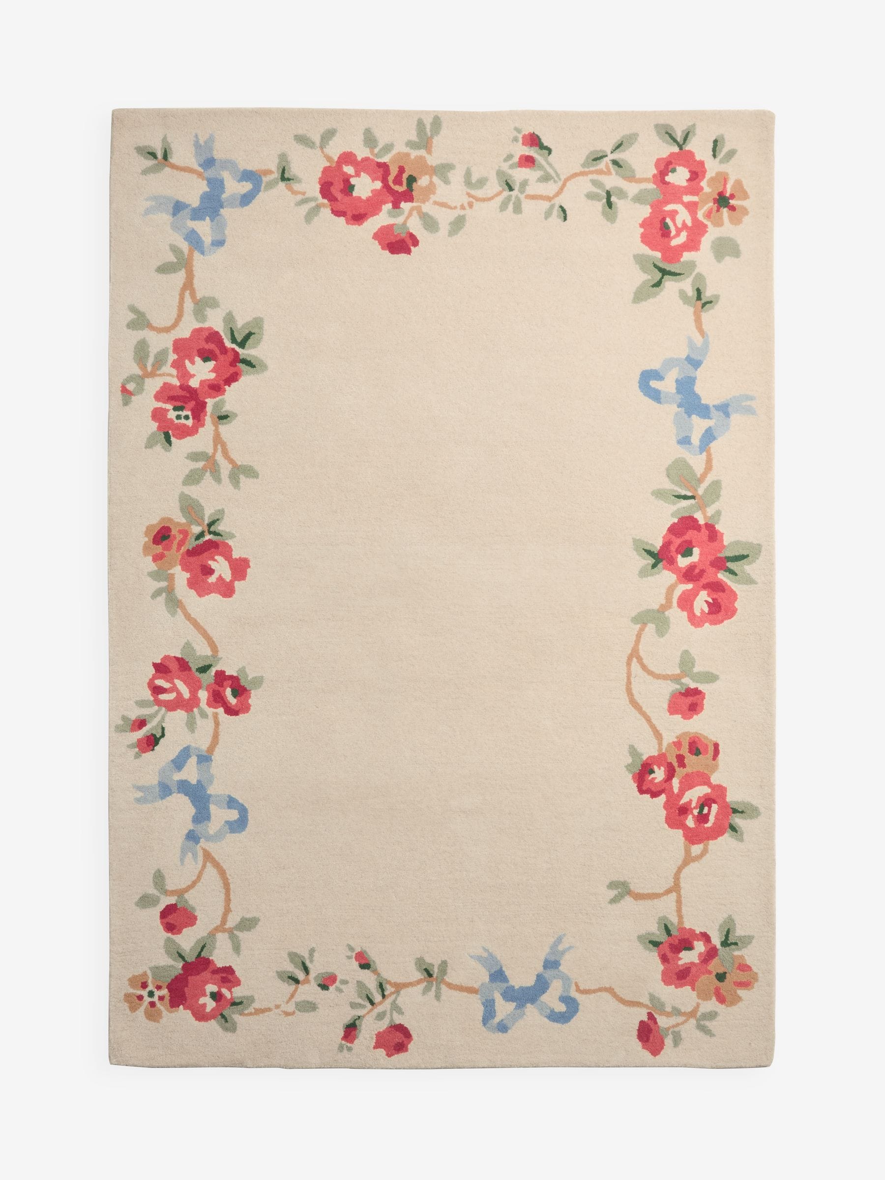 Cath Kidston wool tufted rug in rose and bows design, imported from the UK