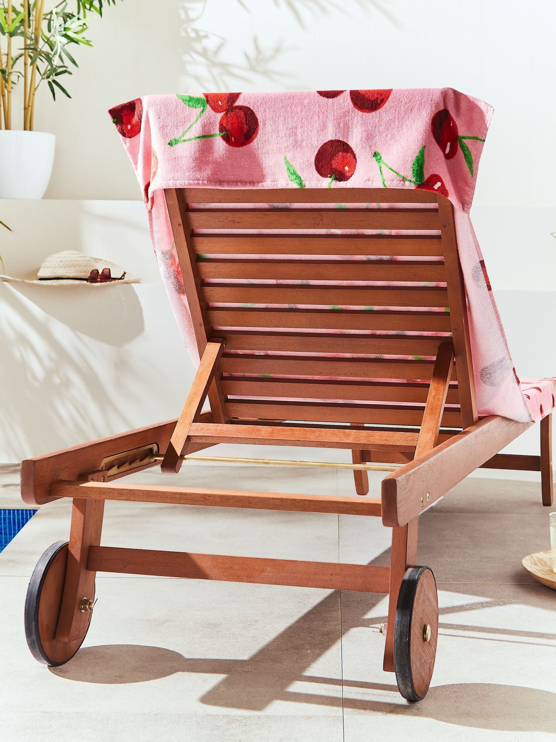 Catherine Lansfield pink cherries cotton beach towel, imported from the UK