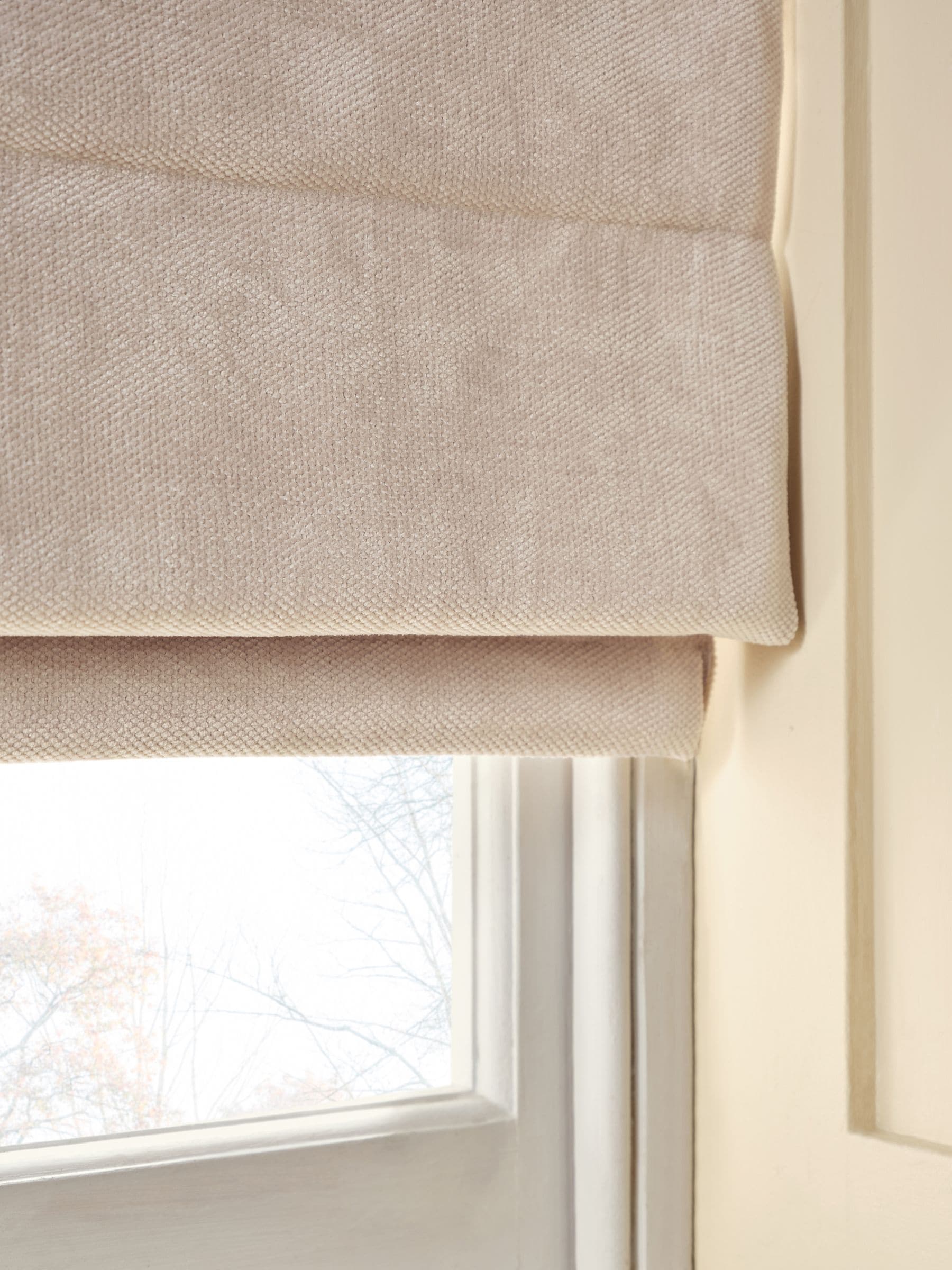 Natural blackout roman blind fine chenille, imported from the UK
