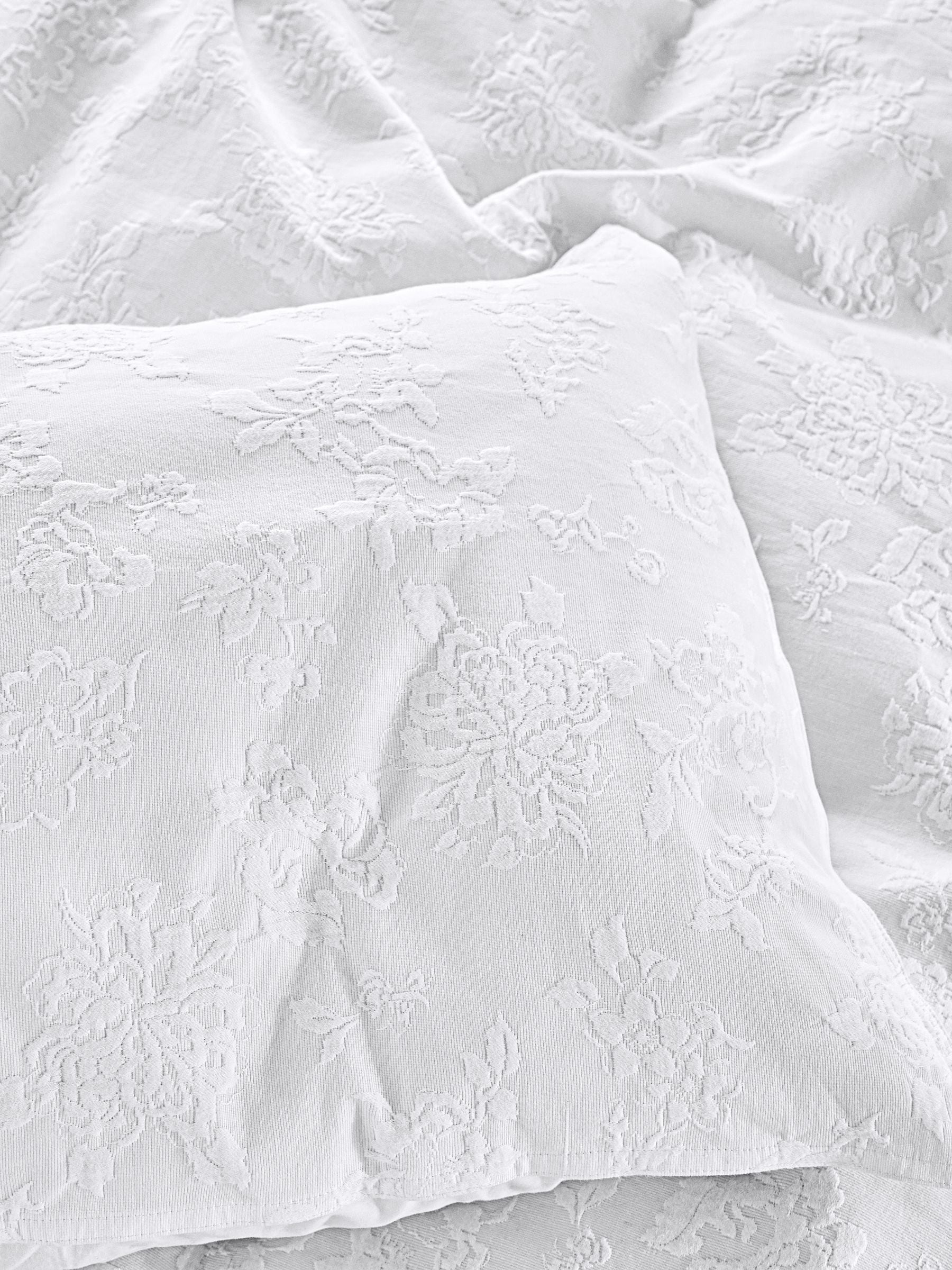 Shabby Chic white floral matelasse pillowcases, imported from the UK