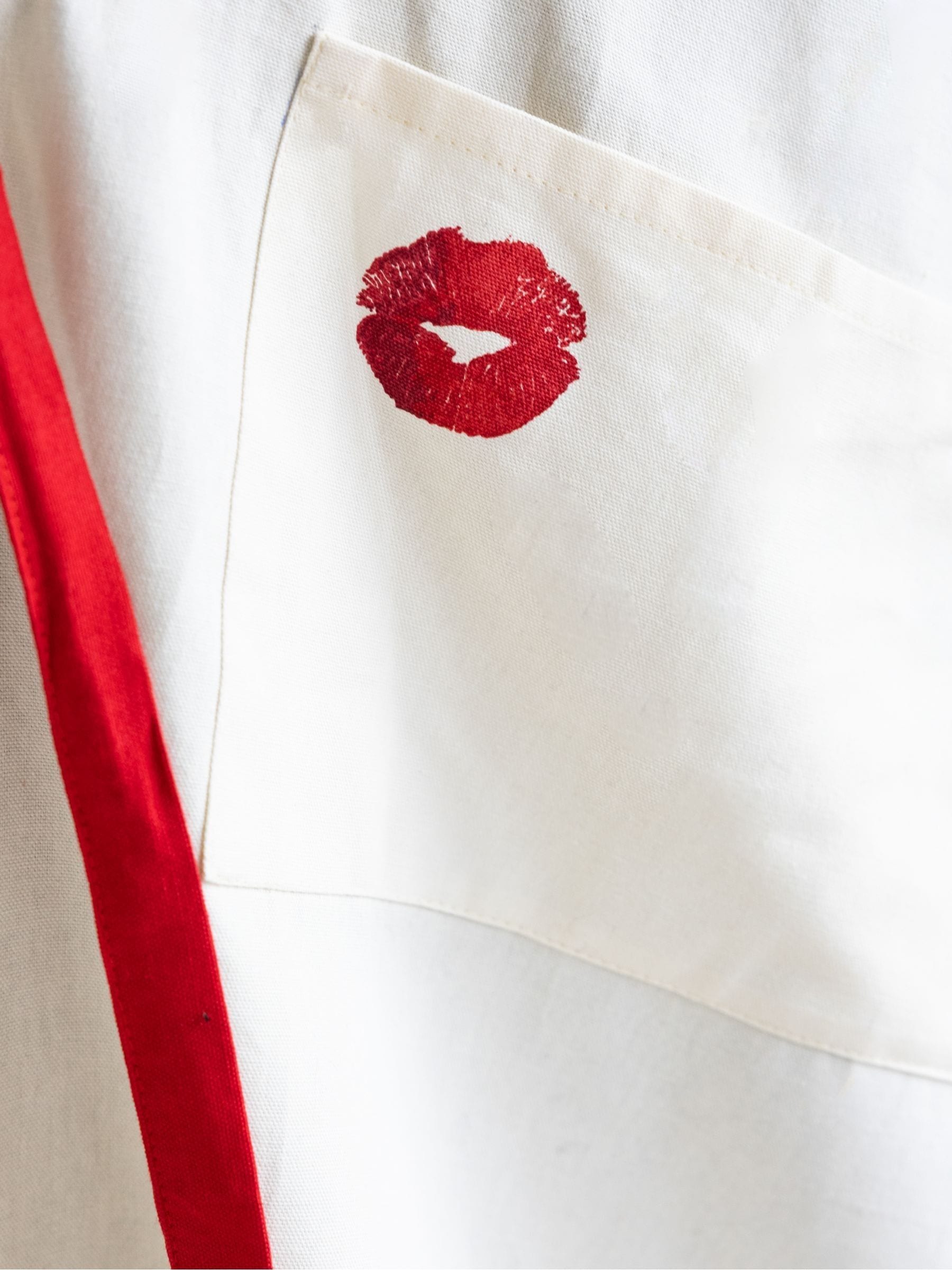 Rockett St George red lipstick apron, imported from the UK
