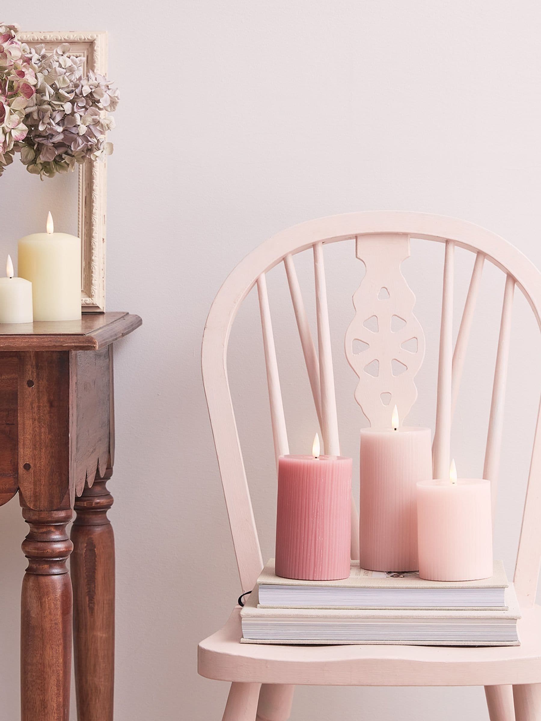 Lights4fun pink LED pillar candle trio with varying heights, UK version
