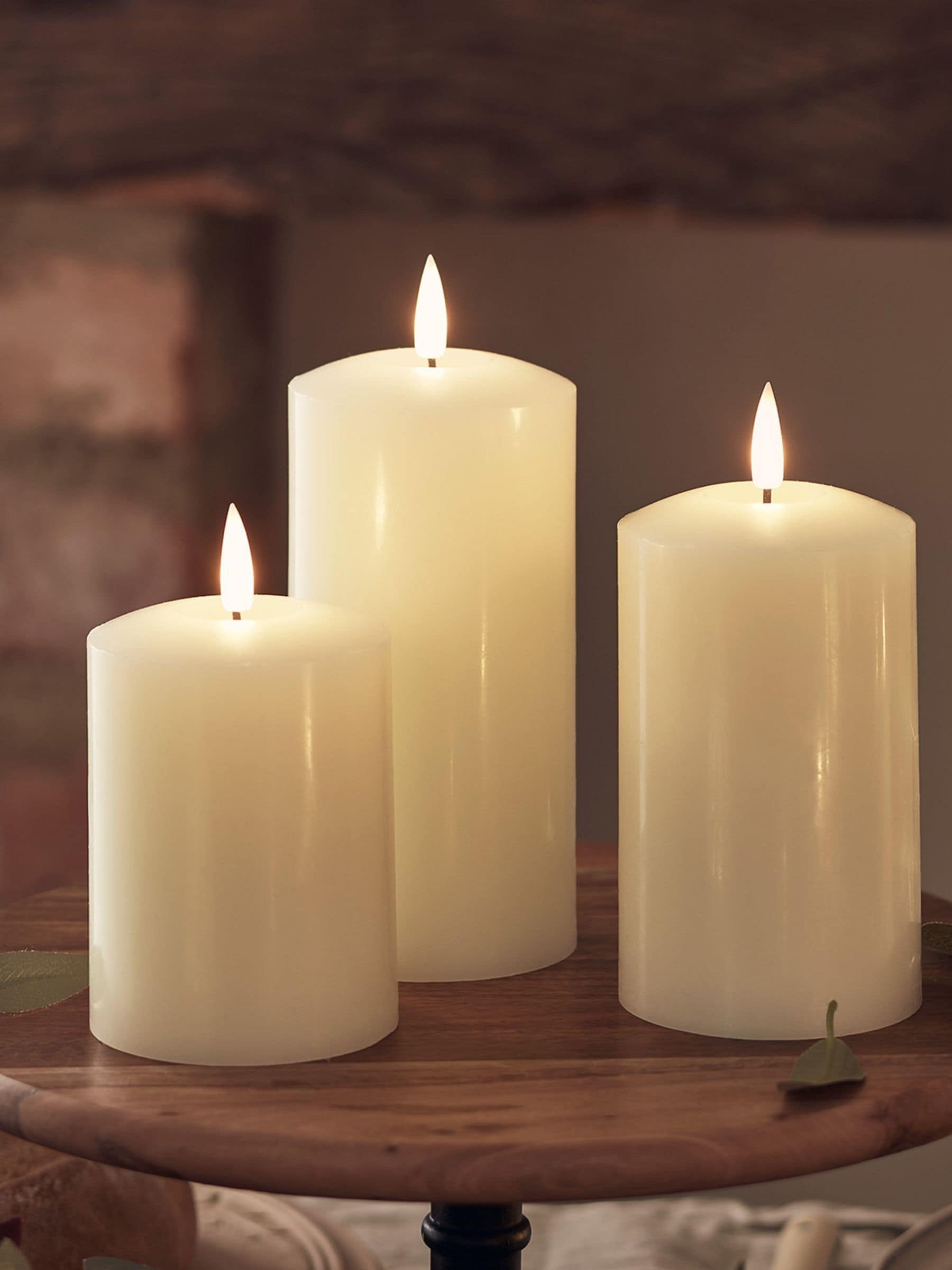 Lights4fun Natural TruGlow rechargeable LED pillar candle trio 15cm, UK version