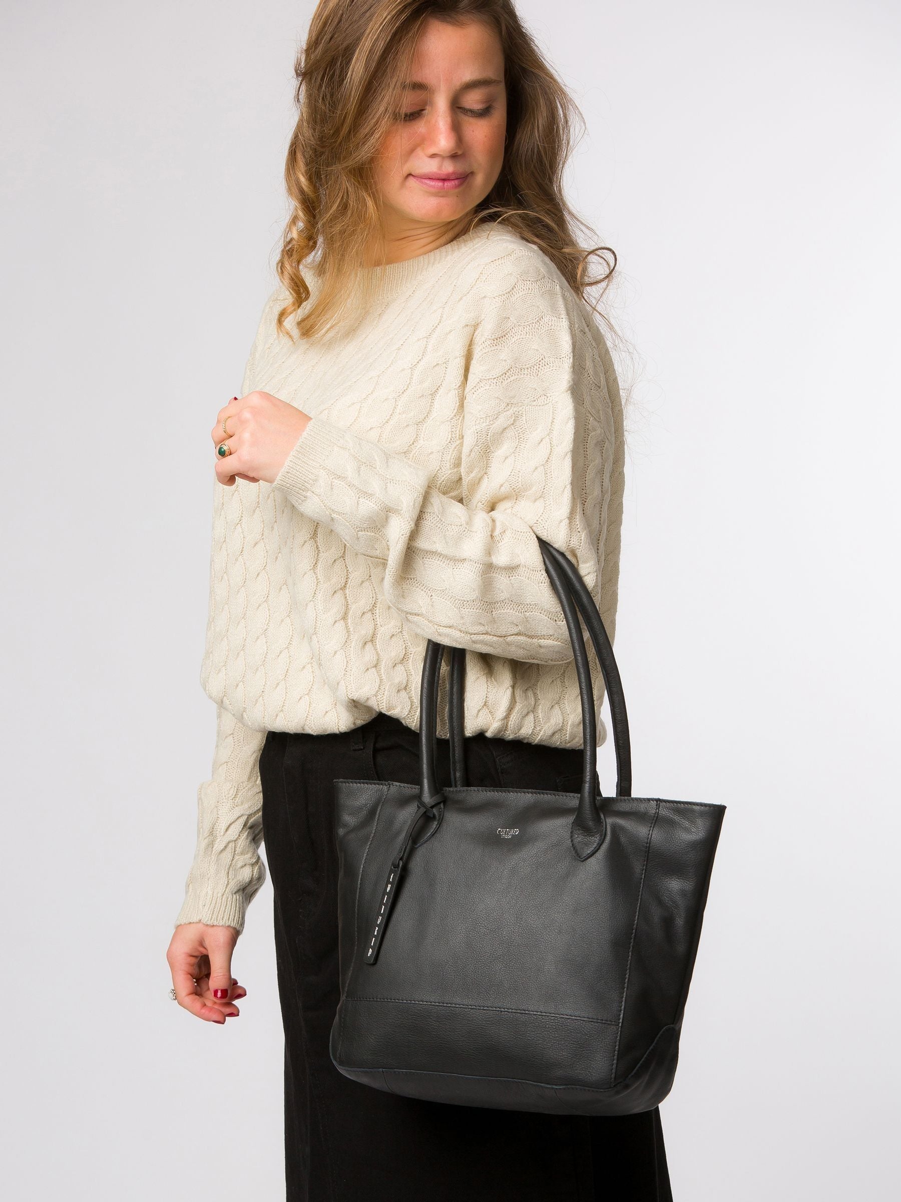Cultured London black leather Sabine tote bag, imported from the UK