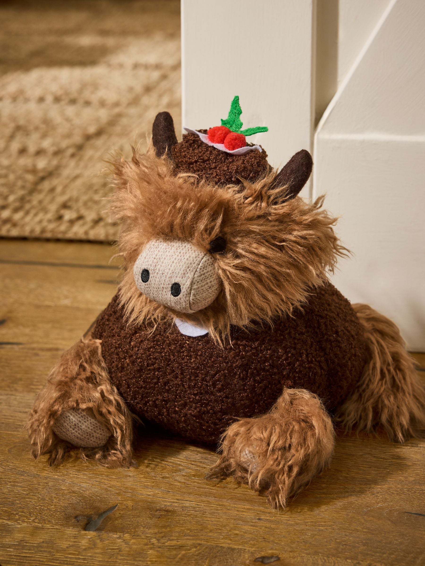 Hamish Highland Cow Christmas Pudding Doorstop, dimensions 25x24x20cm - British product