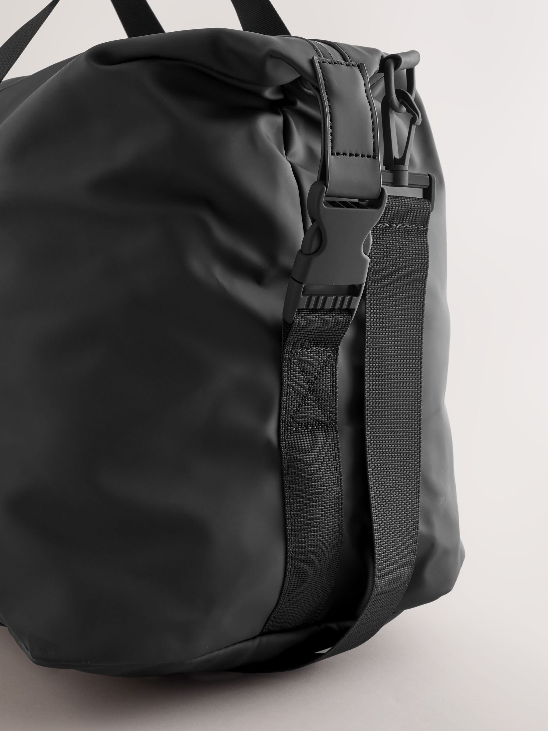 Black rubberised weekend holdall bag UK version