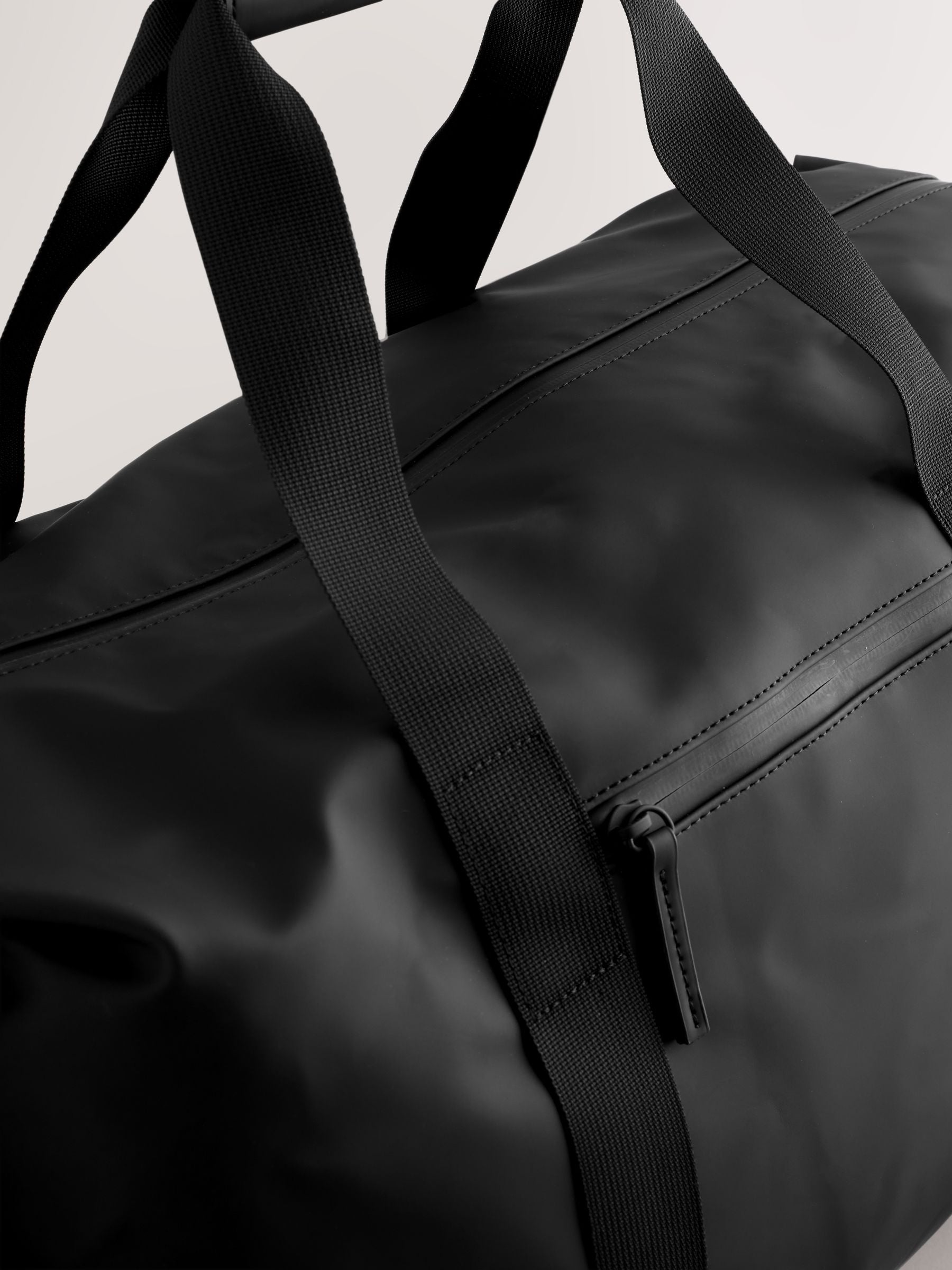 Black rubberised weekend holdall bag UK version