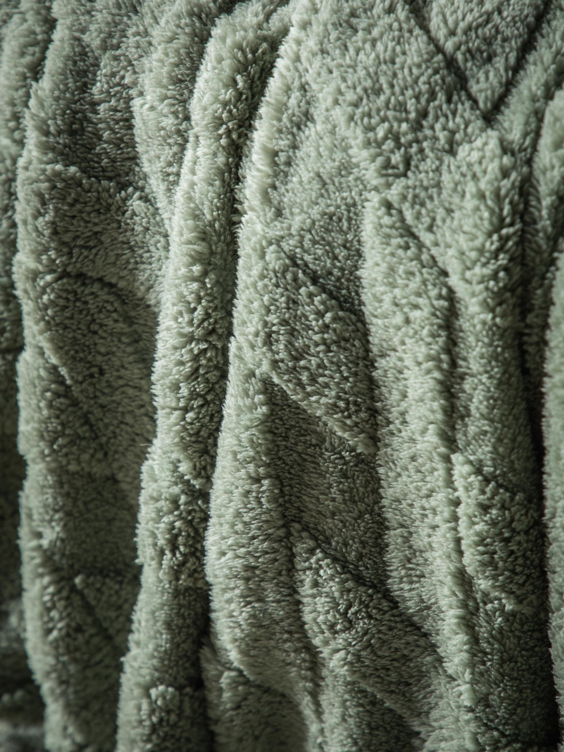 Gallery Home green cross knit throw, imported from the UK