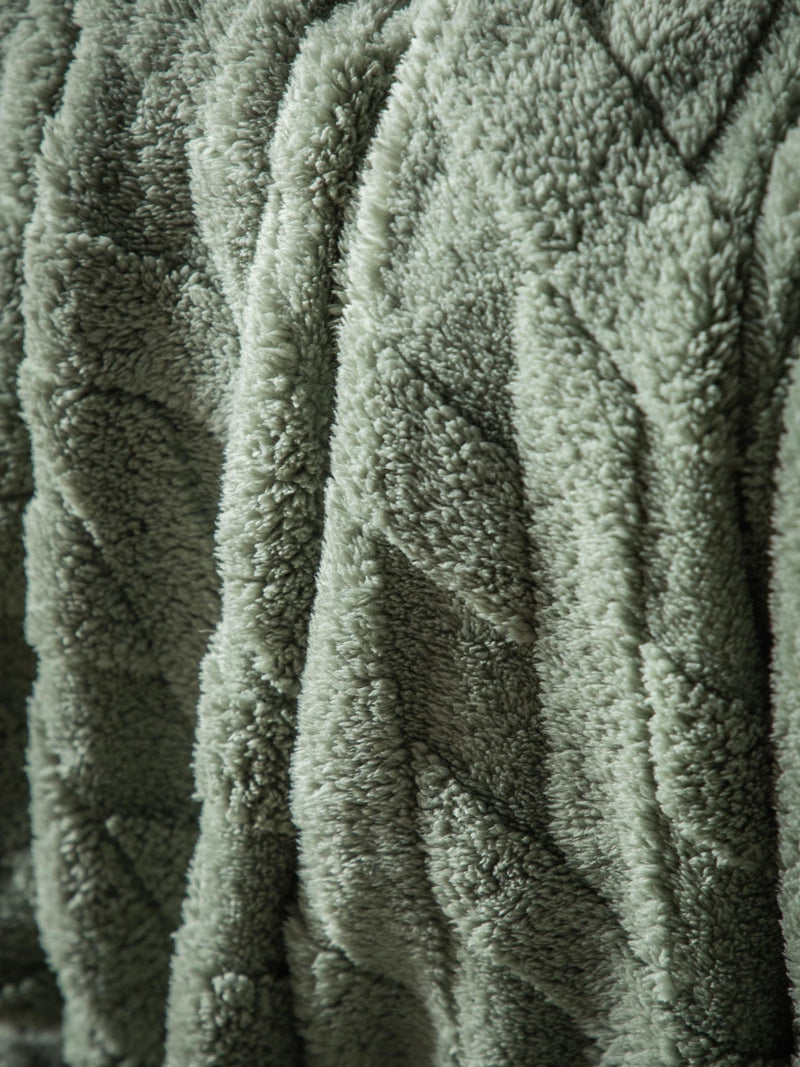 Gallery Home green cross knit throw, imported from the UK